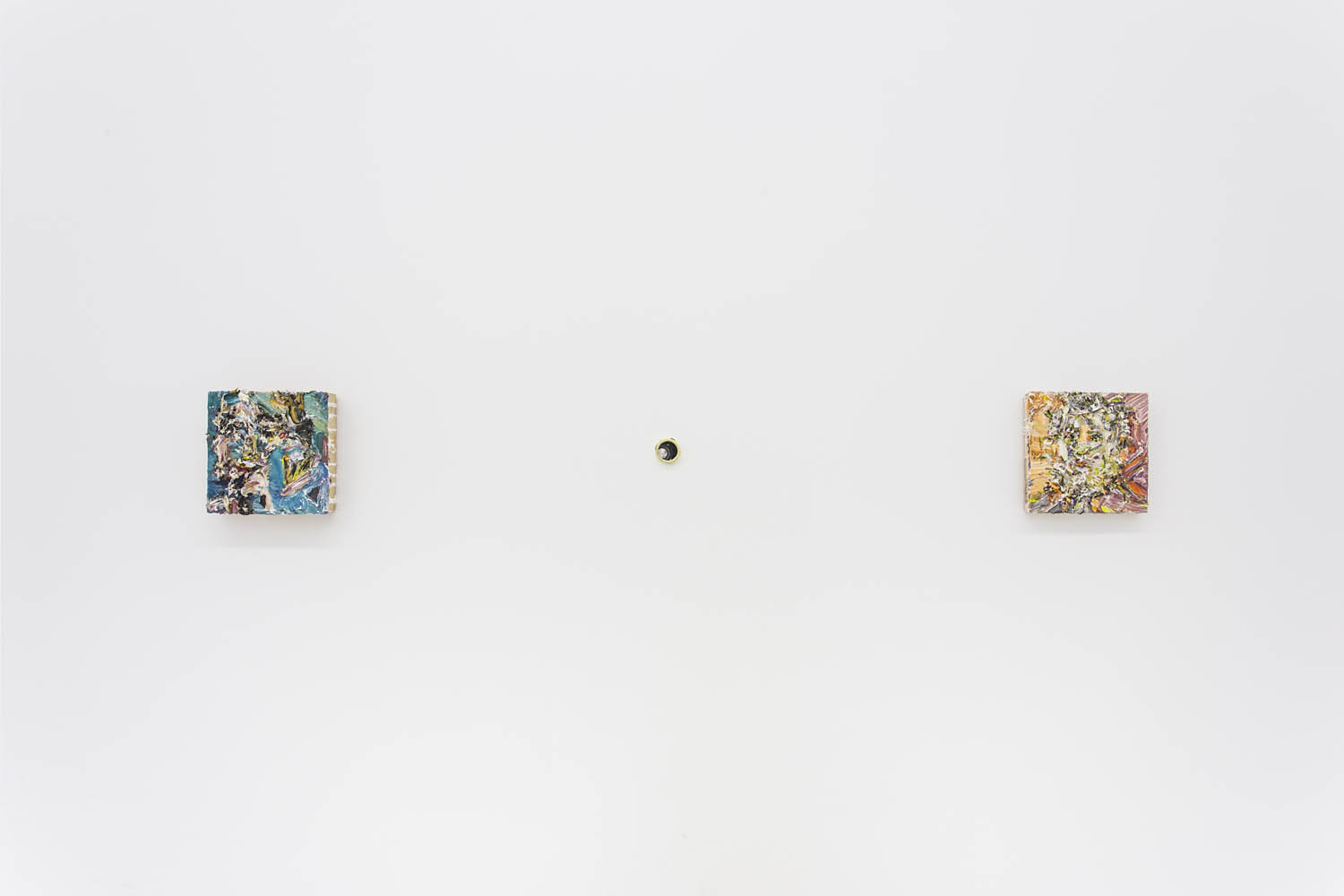 VP Install peephole between paintings.jpg